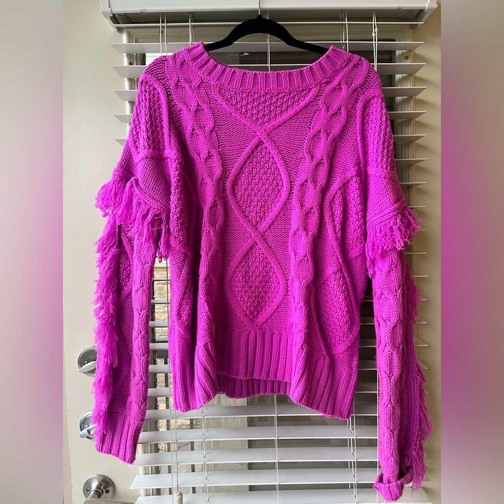 Magenta size medium sweater with arm fringe detail